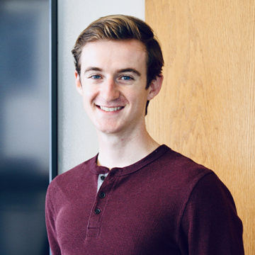 Smiling headshot of Mason Reece